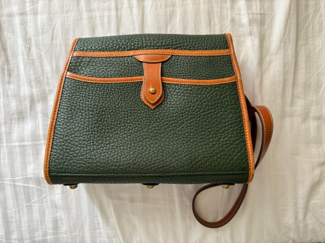Vintage Dooney and Bourke shoulder bag (Category: Shoulder Bags) located in Manila. Submitted by phiascart (Listing ID 1343917857, Image 2). Description: Dooney and Bourke shoulder bag like new, never been used but with slight flaws price is negotiable .