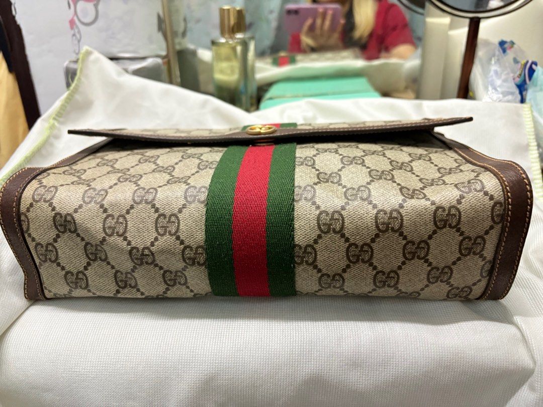 Gucci clutch bag vintage (Category: Luxury Bags & Wallets) located in Calamba. Submitted by neviross05 (Listing ID 1343941892, Image 2). Description: AUTHENTIC GUCCI GG CHERRY LINE CLUTCH BAG VINTAGE RFS:decluttering Can send more pics and vids J&T Lalamove Gcash.
