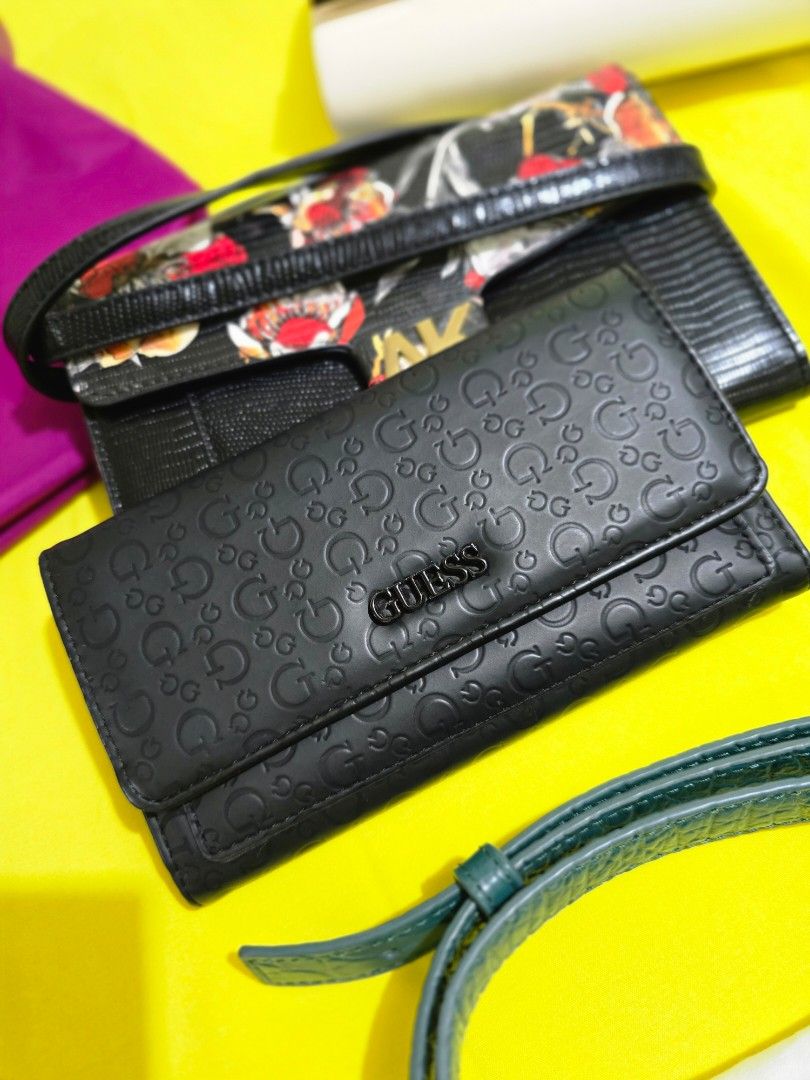 Guess Wallet (Category: Wallets & Card holders) located in Dasmarinas. Submitted by preowned_stuff (Listing ID 1343942845, Image 1). Description: slightly use.