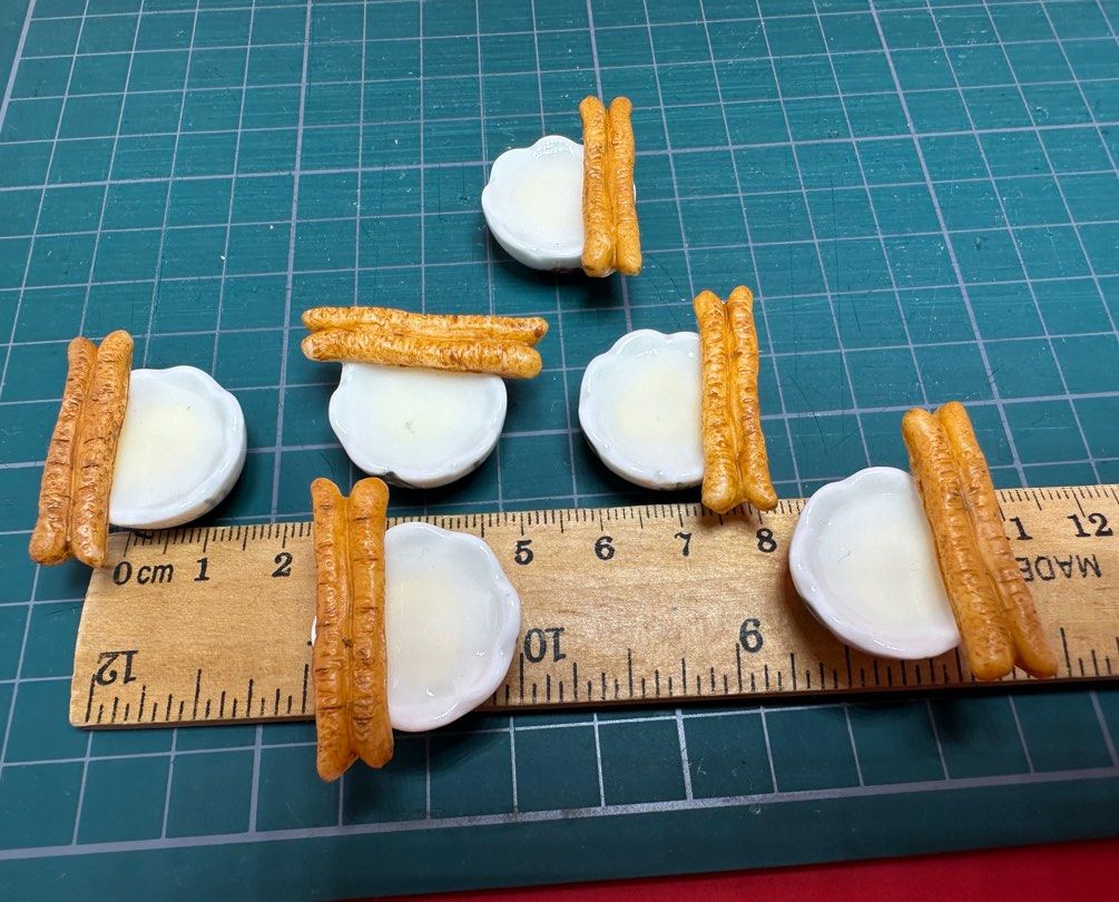 Handmade Miniature Breakfast Soy Milk with Youtiao, 豆浆油条, clay, resin, 1 bowl (Category: Handmade Craft) located in Singapore. Submitted by mini.collectibles.1 (Listing ID 1343911687, Image 2). Description: Handmade Miniature Breakfast Soy Milk with Youtiao, 豆浆油条, clay, resin, 1 bowl All are handmade. Size may varies. May have finger pressing stains. Made from clay, resin. Miniature Showcase Display Store at the address below: Blk 2019 Bukit Bato