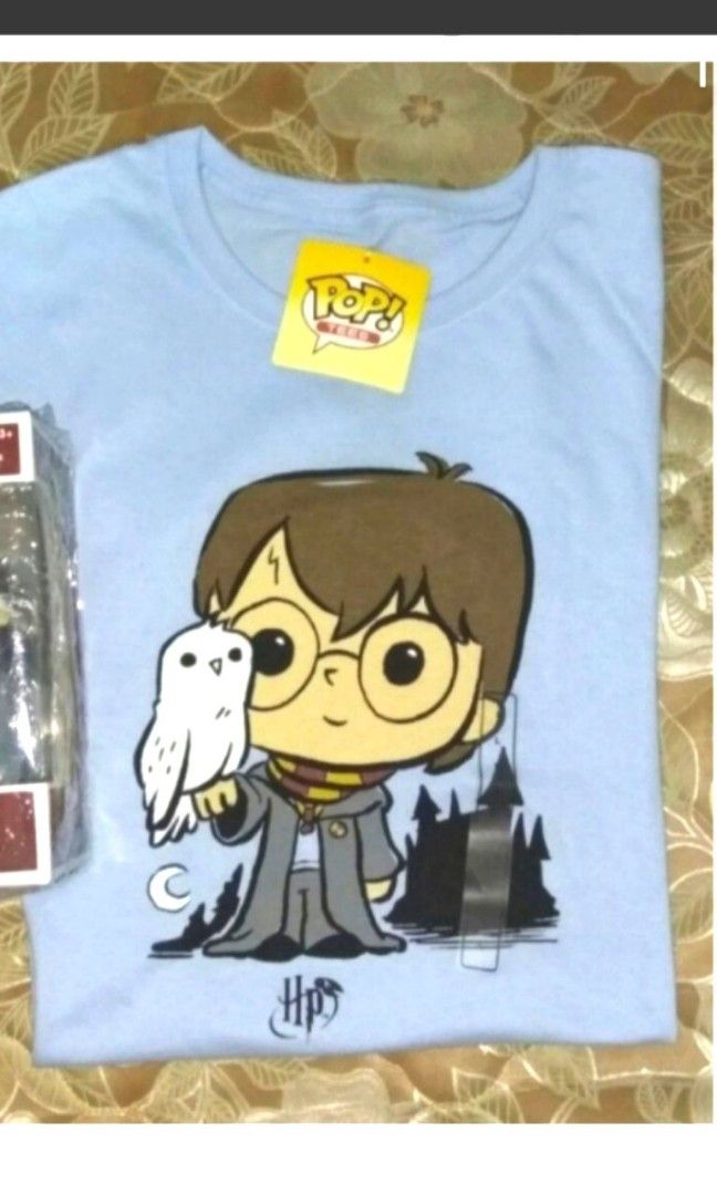 Harry Potter & Hedwig Funko Pop & Pop Tee Bundle (Category: Western Merchandise) located in Taguig. Submitted by whozitandwhatzits (Listing ID 1344003252, Image 2). Description: Selling as a set of 2. Pop Tshirt size available is Small & Large..