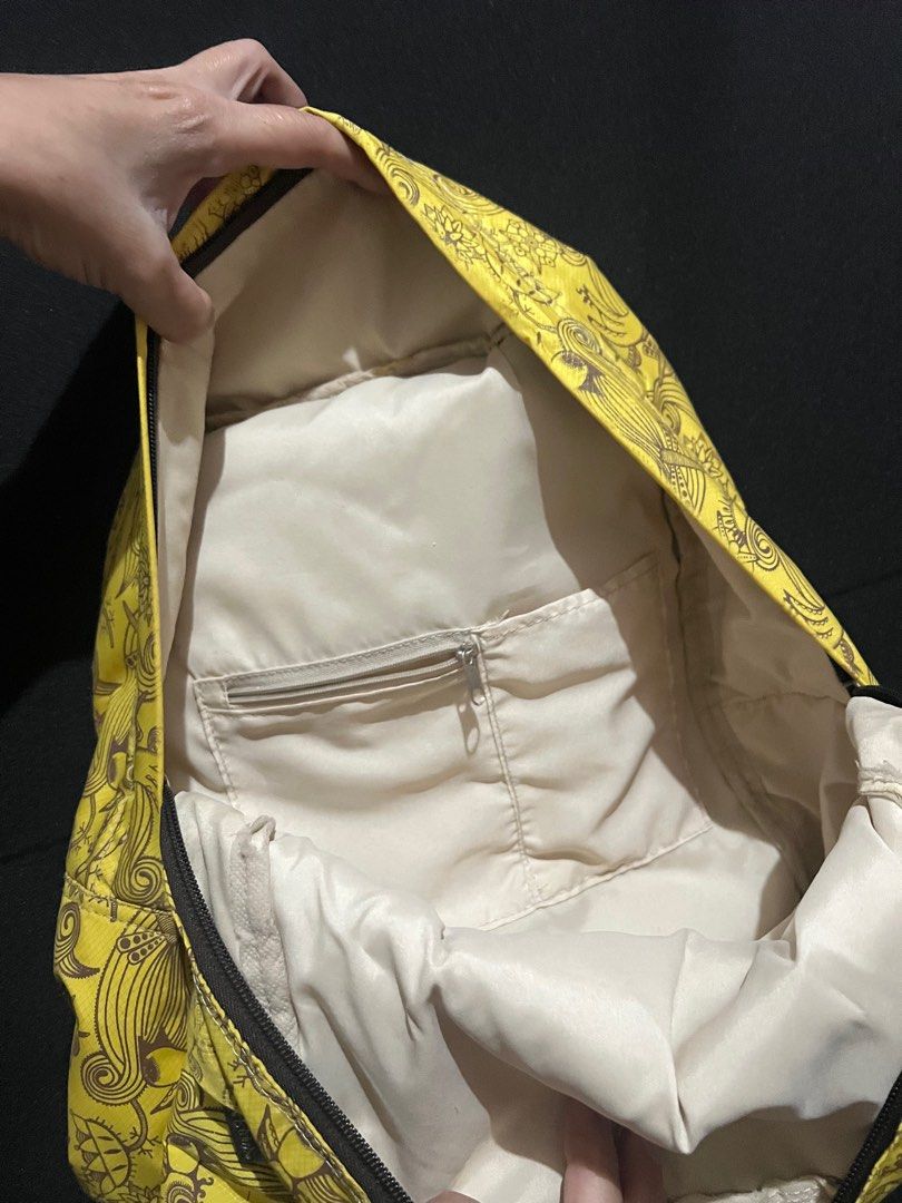 Heartstrings yellow doodle backpack (Category: Backpacks) located in Mandaluyong City. Submitted by sandylingling94 (Listing ID 1344039405, Image 3). Description: Newly washed, used but not abused All zippers still functional, super cute design 💕.