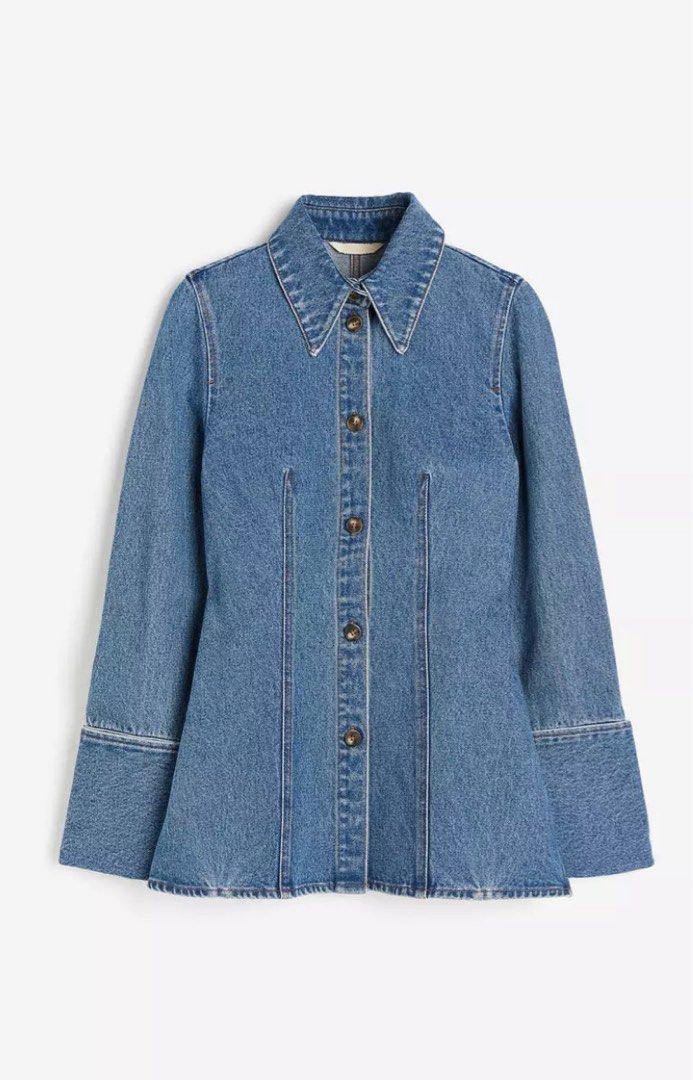 H&M Edition Fitted Denim Shirt (Category: Longsleeves) located in Makati City. Submitted by style.cents (Listing ID 1344036434, Image 1). Description: Fitted shirt in sturdy denim with a pointed collar and buttons down the front. Shaping darts at the front and back, long sleeves and folded, open cuffs with decorative buttons. Straight cut hem with a slit at each side. Shirt can be worn as a jacket Orig price: P3,290 Never worn .