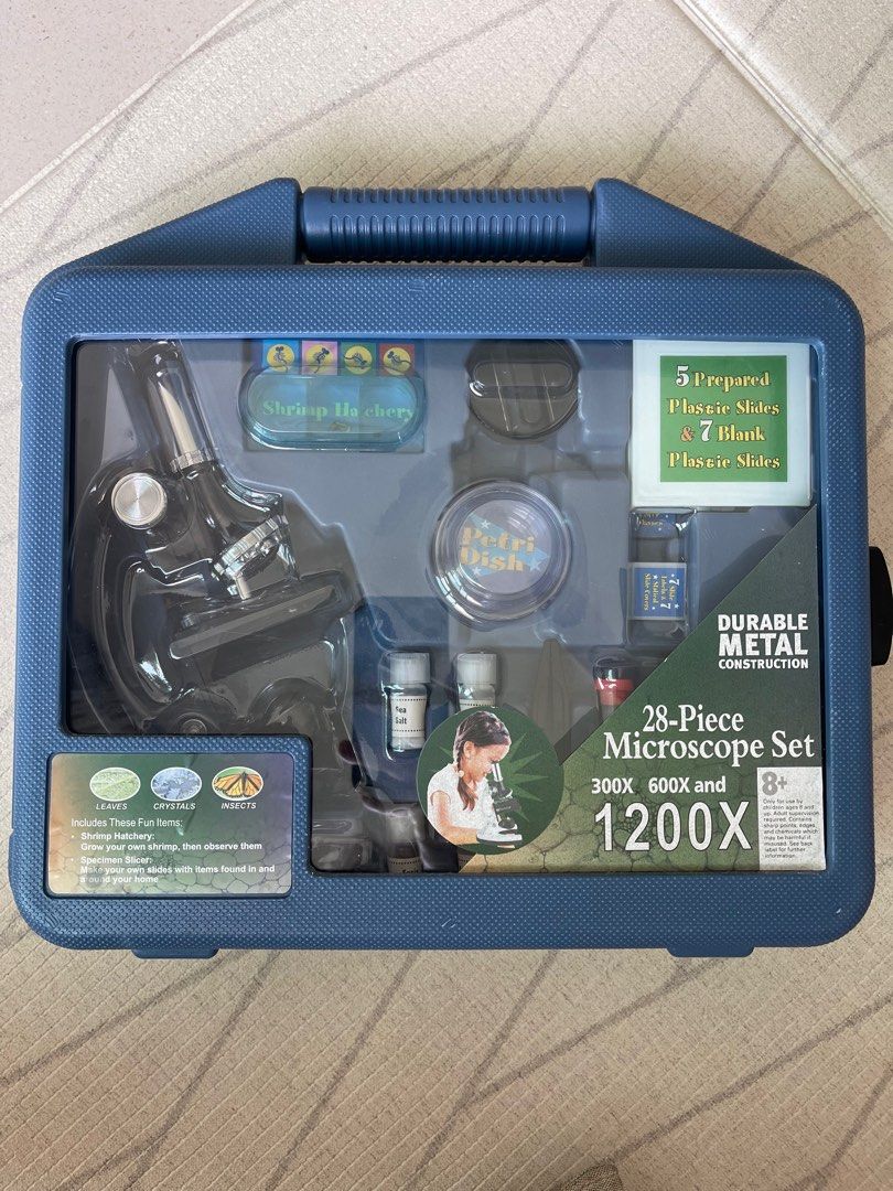 Kids Basic Microscope Kit (Category: Educational & Learning Toys) located in Singapore. Submitted by jazsishon (Listing ID 1343904236, Image 2). Description: Superb quality Metal bodied, fully adjustable biological microscope 100x – 1200x magnification for a variety of specimens Adjustable illuminator to bring out the best specimen details Choose between vertical or angled viewing positions Also includes 7 reusable blank slides with covers and a 