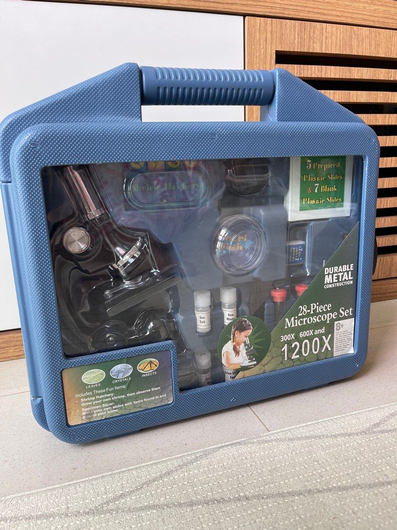 Kids Basic Microscope Kit (Category: Educational & Learning Toys) located in Singapore. Submitted by jazsishon (Listing ID 1343904236, Image 1). Description: Superb quality Metal bodied, fully adjustable biological microscope 100x – 1200x magnification for a variety of specimens Adjustable illuminator to bring out the best specimen details Choose between vertical or angled viewing positions Also includes 7 reusable blank slides with covers and a 