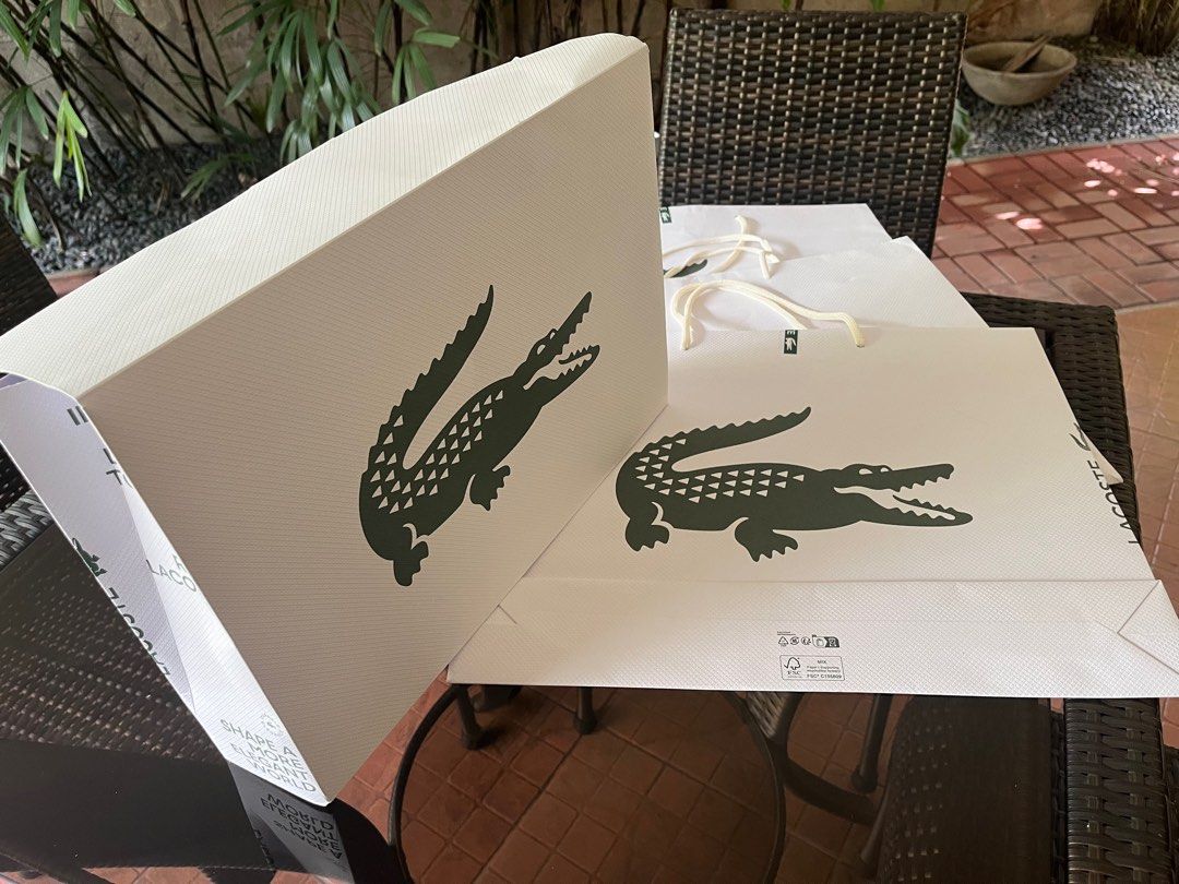 Lacoste paper bags + gift box (Category: Luxury Accessories) located in Paranaque City. Submitted by nikka411 (Listing ID 1343909178, Image 1). Description: Set of 3 Lacoste paper bags + gift box Like new condition 45cm x 35cm RFS decluttering MOP BPI or GCash Shipping fee c/o buyer via Lalamove or Grab.