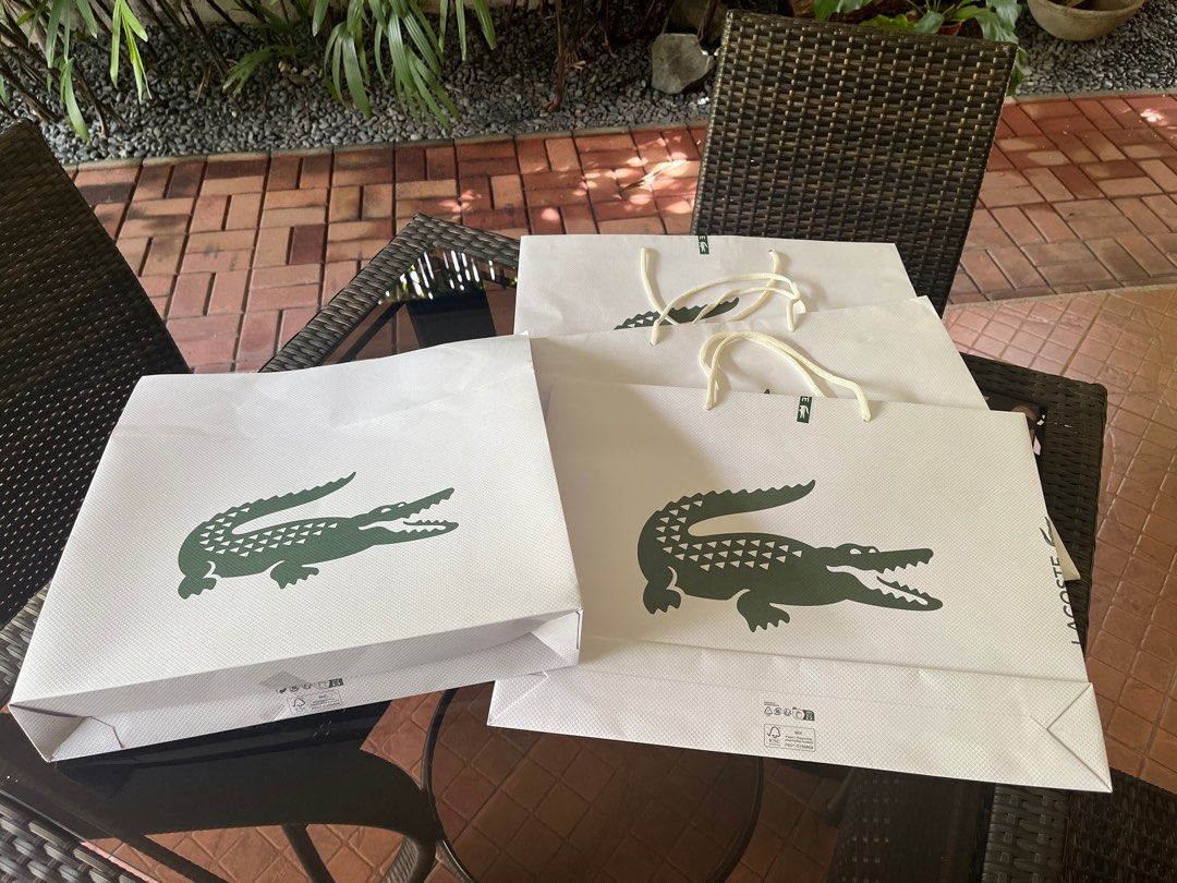 Lacoste paper bags + gift box (Category: Luxury Accessories) located in Paranaque City. Submitted by nikka411 (Listing ID 1343909178, Image 2). Description: Set of 3 Lacoste paper bags + gift box Like new condition 45cm x 35cm RFS decluttering MOP BPI or GCash Shipping fee c/o buyer via Lalamove or Grab.