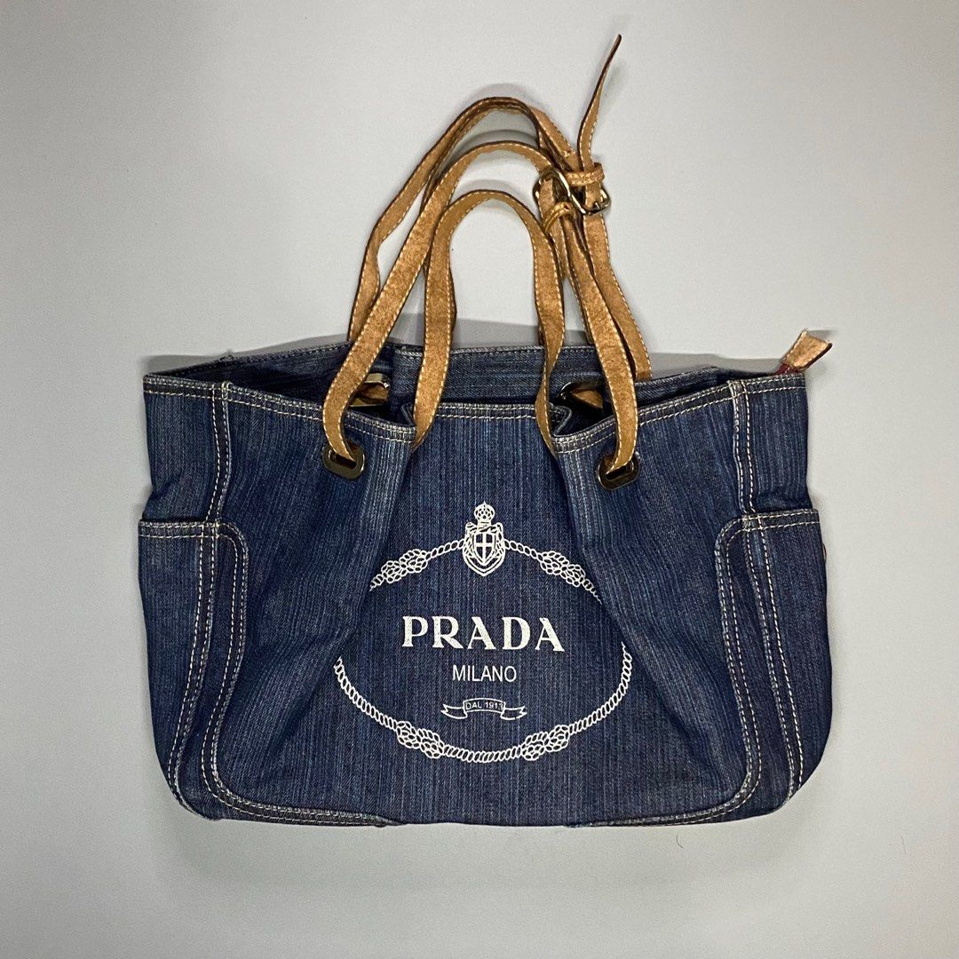 PRADA MILANO DENIM Handbag (Category: Luxury Bags & Wallets) located in Baguio. Submitted by macshop_items (Listing ID 1343969374, Image 1). Description: PRADA MILANO DENIM Handbag - Excellent condition - Signs of usage - L 10 x W 19 ₱ 3,280 + sf.