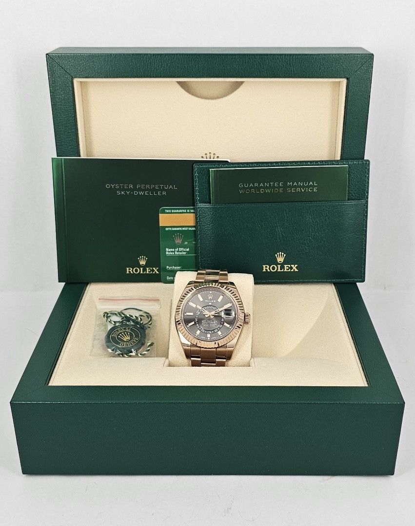 18k full rose gold Rolex Sky-dweller 42mm (Slate Rhodium) Ref: 326935 with full RX-8 protection film (Category: Watches) located in Singapore. Submitted by antiquecastle (Listing ID 1344240848, Image 2). Description: 18k full rose gold Rolex Sky-dweller (Slate Rhodium) Ref: 326935 with full RX-8 protection film since day 1. Automatic Movement: Caliber 9001 Model Reference no: 326935 Year: 2019 Glass: Sapphire Original Bezel: 18k full rose gold Ca