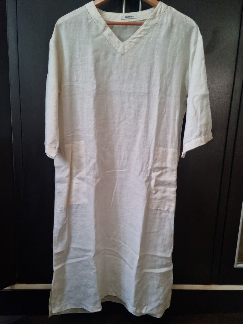 Cream linen tunic dress (Category: Dresses) located in Makati City. Submitted by cmacloset (Listing ID 1344122695, Image 1). Description: -Cream linen tunic dress w/pockets. Slightly see through--undergarment required. Or can be used as a beach cover up :) -Can fit up to S -Width across: 35.5 in, length: 44 in.