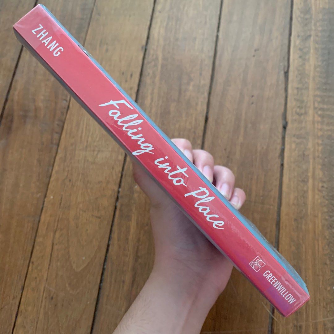 Book: Falling Into Place by Amy Zhang (Category: Storybooks) located in Baguio. Submitted by teocrumbs (Listing ID 1344109714, Image 2). Description: ITEM CONDITION - No tears/stains/creases - Spine is not damaged - Has plastic cover - Read this once but has been stored ever since MOP: GCASH (PAYO) MOD: J&T only (around 75 pesos; shipping shouldered by buyer); can do meet up if Baguio location.