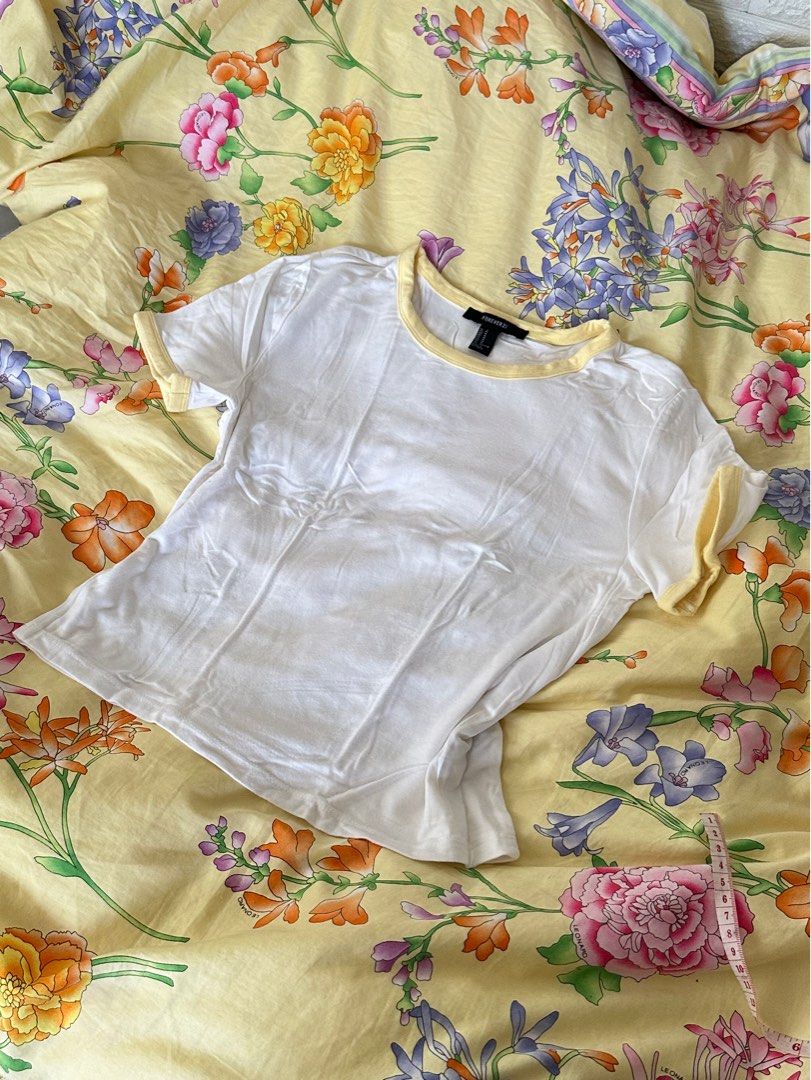 forever 21 white baby tee flowy (Category: Shirts) located in Quezon City. Submitted by moocho (Listing ID 1344076833, Image 1). Description: .
