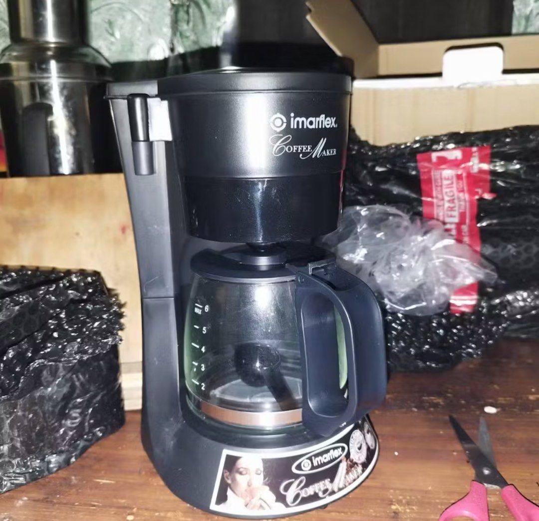 Imarflex ICM-300 Coffee Maker 4 to 6 cups ICM300 (Category: Coffee Machines & Makers) located in Manila. Submitted by calligraphybyden (Listing ID 1344100992, Image 2). Description: Sold for 1,200 pesos Now only 900 pesos Still inside the box Auto drip coffee maker 4 to 6 cups of coffee Thermo-glass carafe Reusable / washable filter Pilot light indicator Keep warm heating plate Water level indicator Ground coffee 600watts Rfs: received as gift.