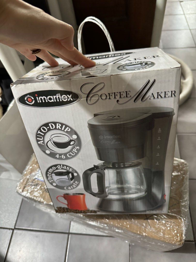 Imarflex ICM-300 Coffee Maker 4 to 6 cups ICM300 (Category: Coffee Machines & Makers) located in Manila. Submitted by calligraphybyden (Listing ID 1344100992, Image 3). Description: Sold for 1,200 pesos Now only 900 pesos Still inside the box Auto drip coffee maker 4 to 6 cups of coffee Thermo-glass carafe Reusable / washable filter Pilot light indicator Keep warm heating plate Water level indicator Ground coffee 600watts Rfs: received as gift.