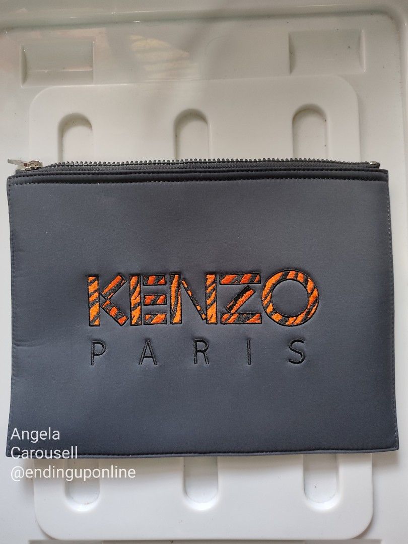 Kenzo Paris Embroidered Pouch Neoprene Material (Authentic) (Category: Luxury Bags & Wallets) located in Batangas. Submitted by endinguponline (Listing ID 1344165116, Image 2). Description: Item: Kenzo Paris Embroidered Pouch Neoprene Clutch with dust bag (authentic item from Kuwait) Brand: Kenzo Condition: Almost BRAND NEW (nakatago lang sa closet) Flaws: N/A Dimensions: 8.5 x 11.5 inches --- RFS: Decluttering Seller Location: Batangas / Quezon 
