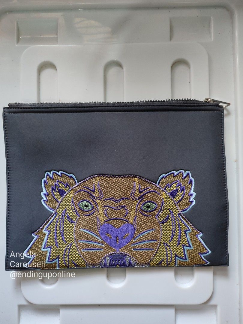 Kenzo Paris Embroidered Pouch Neoprene Material (Authentic) (Category: Luxury Bags & Wallets) located in Batangas. Submitted by endinguponline (Listing ID 1344165116, Image 1). Description: Item: Kenzo Paris Embroidered Pouch Neoprene Clutch with dust bag (authentic item from Kuwait) Brand: Kenzo Condition: Almost BRAND NEW (nakatago lang sa closet) Flaws: N/A Dimensions: 8.5 x 11.5 inches --- RFS: Decluttering Seller Location: Batangas / Quezon 