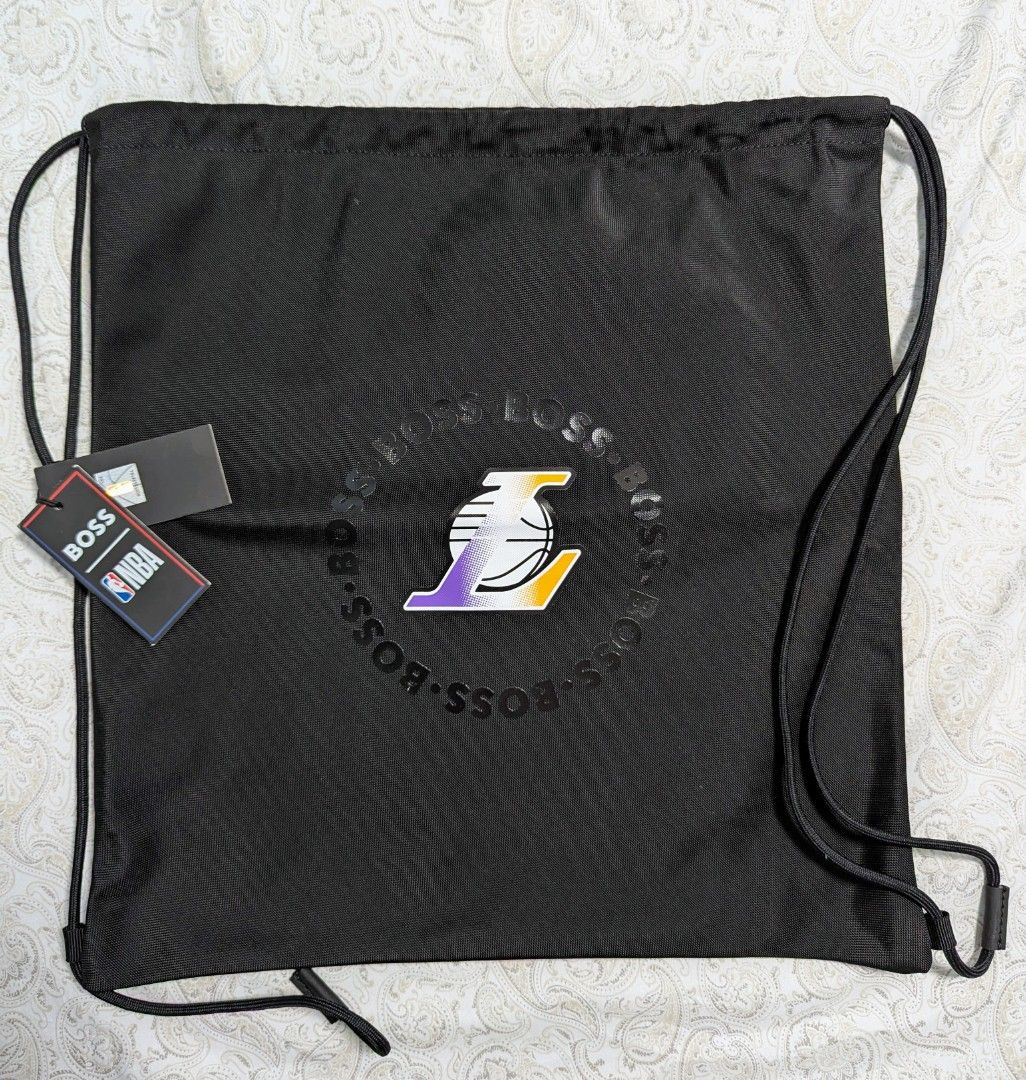 Lakers Hugo String Bag (Category: Luxury Bags & Wallets) located in Las Pinas. Submitted by jay9191 (Listing ID 1344175750, Image 1). Description: Original Lakers Hugo Boss Collaboration String Bag Brandnew with Tag SRP - $95 Unwanted Gift feom the US Item in Las Pinas Disclaimer: No copyright infringement is intended. I do not own nor claim to own the rights to any of the brands featured or posted.