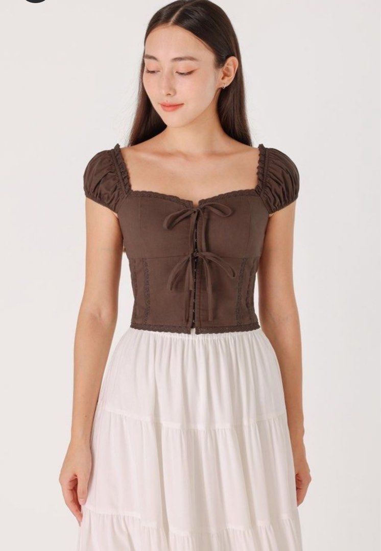 LOVET CIERA TOP BROWN (Category: Blouses) located in Singapore. Submitted by wxnone (Listing ID 1344178435, Image 1). Description: BNWOT $32 mailed or $30 self collect at 640628.