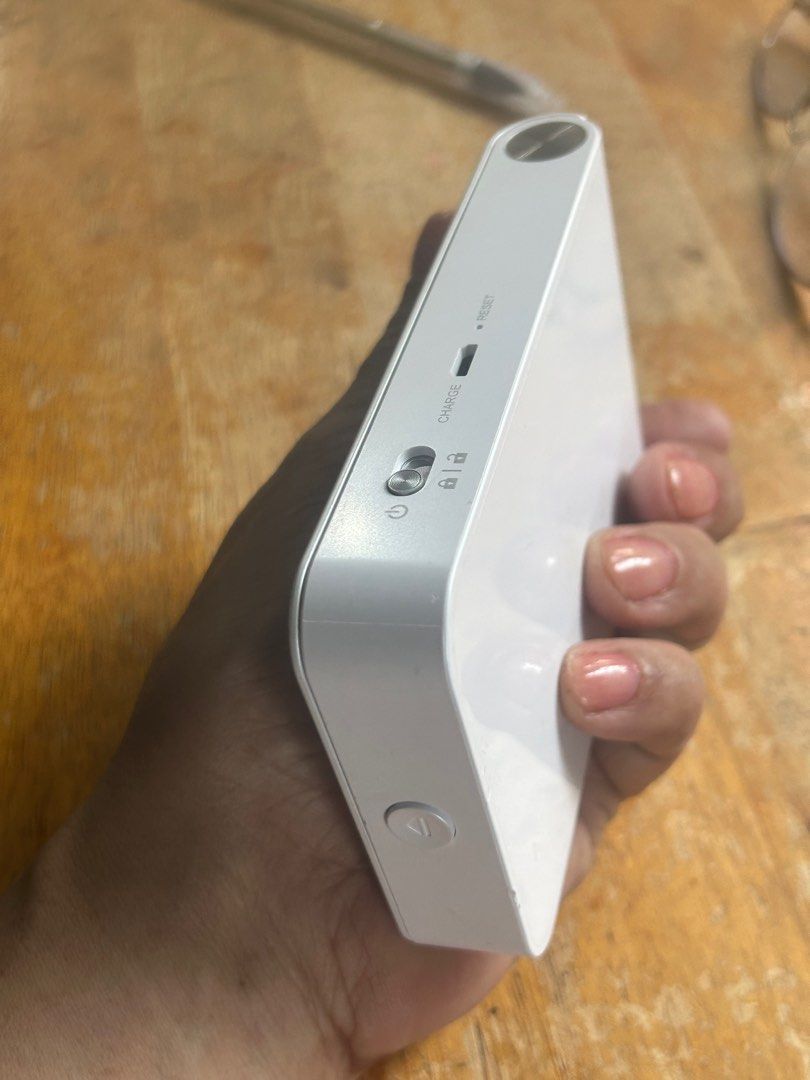 Mini LG photo printer (Category: Cameras) located in Caloocan City. Submitted by guitara1822 (Listing ID 1344067254, Image 1). Description: LG POCKET PHOTO PRINTER PD239 PORTABLE WHITE. Condition is “Used”. Looks like it was never used. Please look at all pictures for the condition. SOLD AS IS NO RETURNS .... Perfect Smartphone and Tablet Companion for Instant Mobile Printing Slimmer Design for Better Portability Resolution - 313 x 600 dpi.
