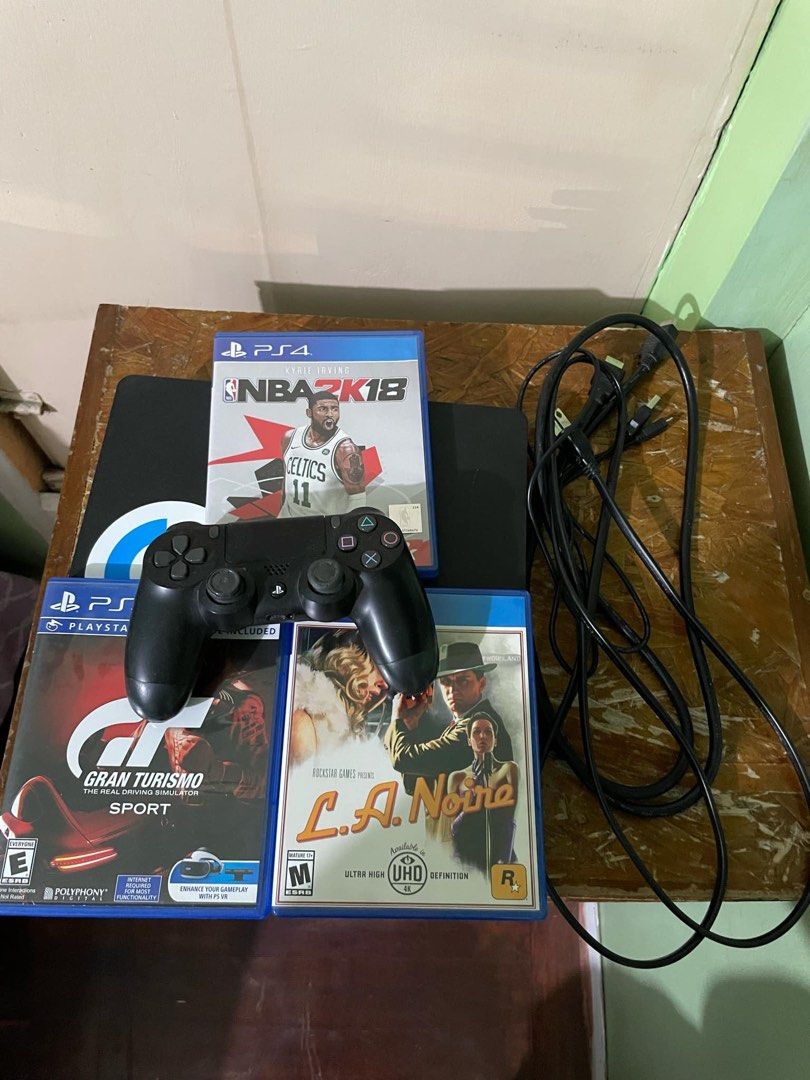 Playstation 4 FOR SALE RUSH (Category: PlayStation) located in Muntinlupa City. Submitted by viesingson (Listing ID 1344211331, Image 3). Description: Playstation 4 for sale SLIM 1TB Around manila or sta rosa laguna Via Lalamove or Grabexpress with or without used games included of your choice (price not included) Games (To be updated): L.A Noire NBA 2k18 Gran Turismo Madden 20 Etc. ISSUE: left analog stick rubber grip came off. other than that, 