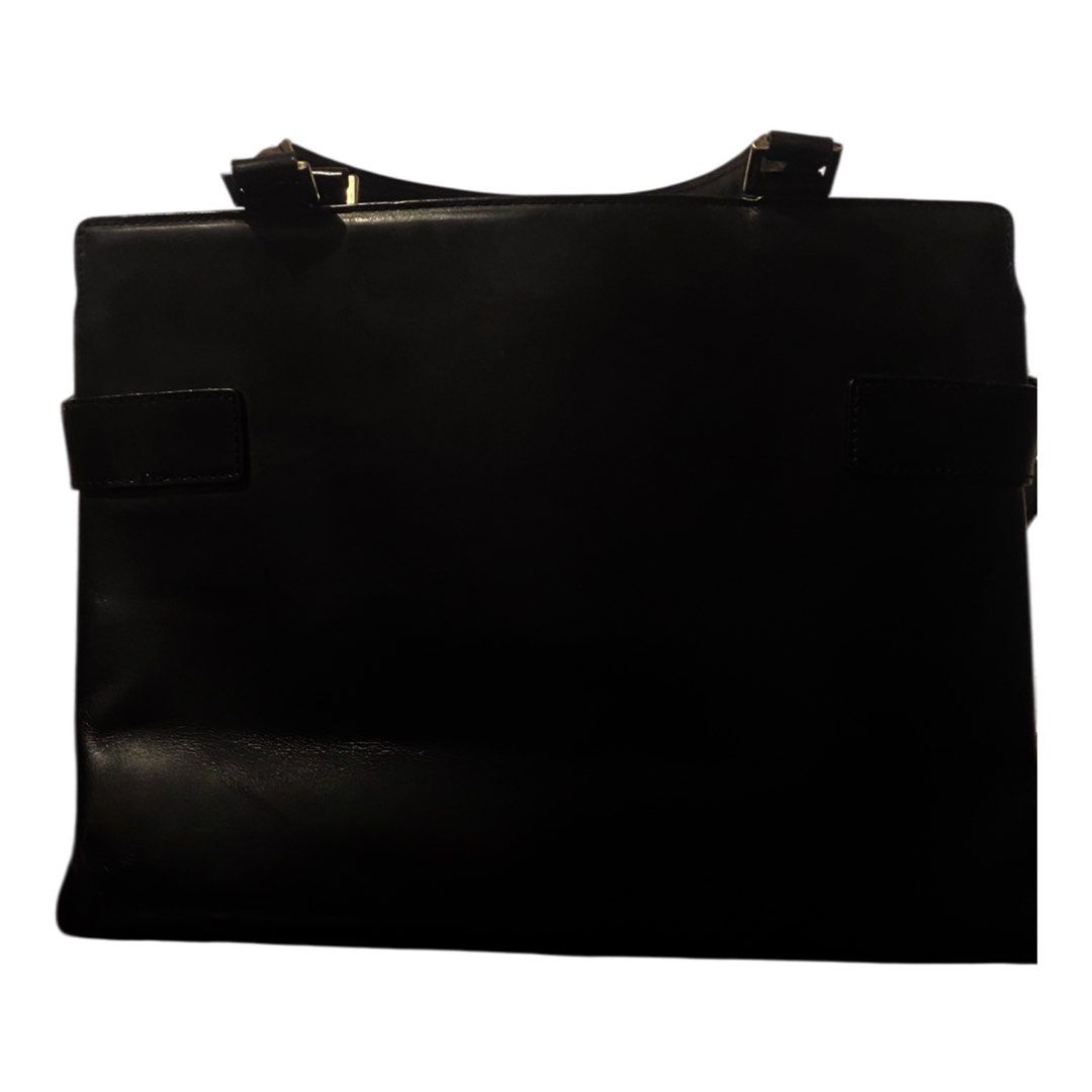 Salvatore Ferregamo bag (Category: Luxury Bags & Wallets) located in Makati City. Submitted by fabiloushop (Listing ID 1344122457, Image 2). Description: Authentic Personal collection of Salvatore Ferreregamo office bag Leather material Comes with the original sling Two-way -shoulder and hand bag depending on your style Width 13x9 x5 .