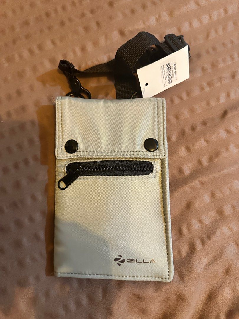 Zilla 3-fold waterproof travel organizer - BNWT (Category: Travel Essentials & Accessories) located in Mandaluyong City. Submitted by lebourriquet (Listing ID 1344174278, Image 1). Description: •rfs: too many travel organizers • color: gray • retail price: php 485.00 MOP: BPI or GCash.
