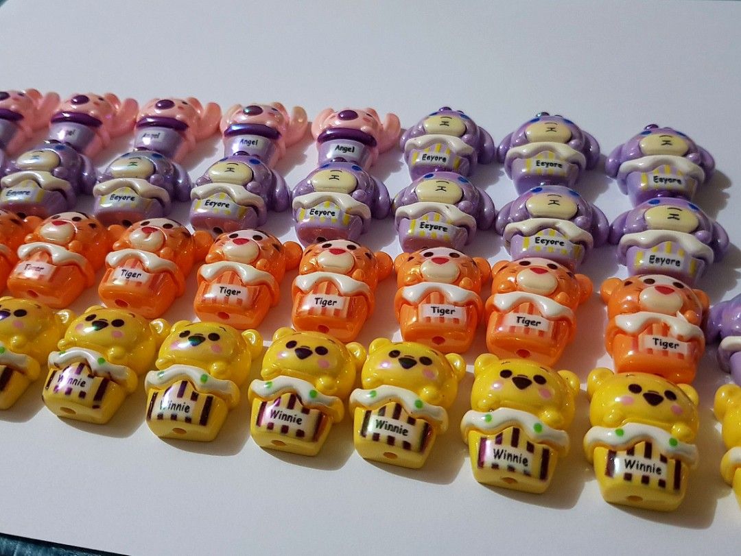 Assorted Beads - UV Plated (36 pieces) (Category: Craft Supplies & Tools) located in Paranaque City. Submitted by tangerinedayz (Listing ID 1344429903, Image 3). Description: Take all for 650 pesos. Characters: Pooh, Eeyore, Tiger, and Angel For beadable pens, bracelet, keychains, and other DIY crafts. Please Note: Pen in photo is just for sample. This is a unofficial item. Actual colors may vary. This is due to computer monitors displaying color