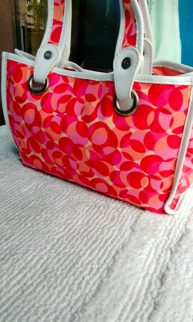 Authentic CELINE (Category: Luxury Bags & Wallets) located in Dasmarinas. Submitted by derliederr63522 (Listing ID 1344353040, Image 3). Description: CELINE Canvas and leather tote bag Pink red and white color Size Height 21.5cm Width 32cm Dept 8cm.