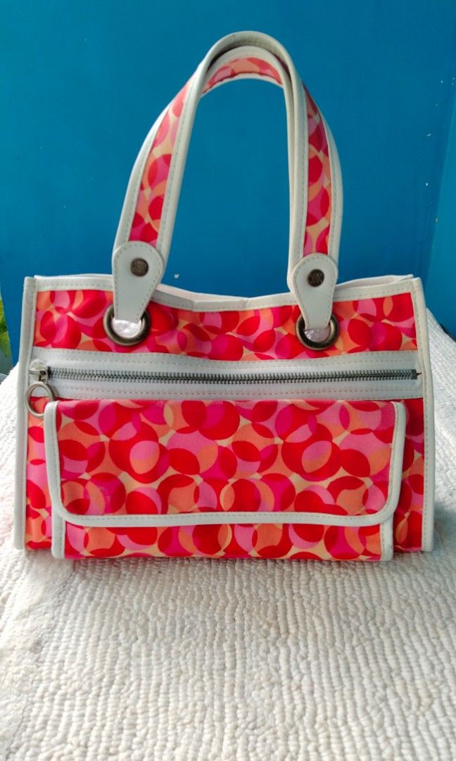 Authentic CELINE (Category: Luxury Bags & Wallets) located in Dasmarinas. Submitted by derliederr63522 (Listing ID 1344353040, Image 1). Description: CELINE Canvas and leather tote bag Pink red and white color Size Height 21.5cm Width 32cm Dept 8cm.