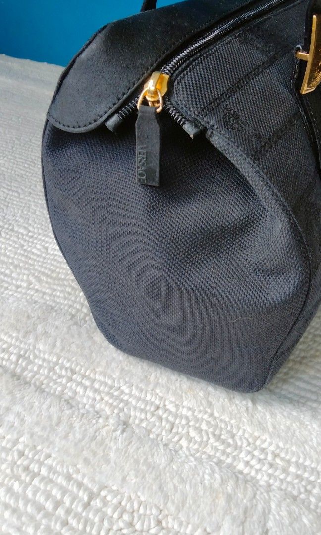 Authentic VERSACE (Category: Luxury Bags & Wallets) located in Dasmarinas. Submitted by derliederr63522 (Listing ID 1344357389, Image 2). Description: VERSACE Handbag tote bag Women's black canvas and leather Size Height 21cm Width 30cm Dept 10cm.