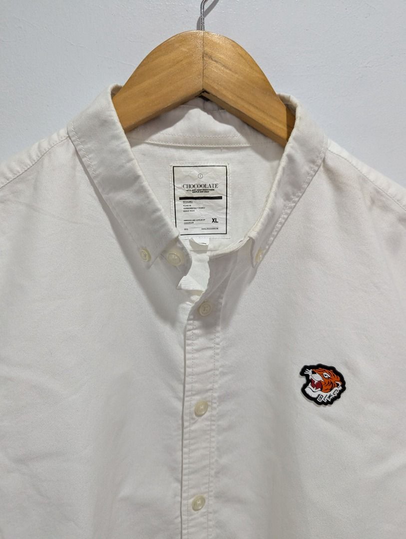 Chocoolate HK Oxford Shirt L (Category: Formal Shirts) located in Antipolo. Submitted by bentakahitanoano (Listing ID 1344347608, Image 2). Description: Still in good condition Size XL perfectly fit to L Retail around 136$ - 8k Pit to pit 22 Length 29.5 Sleeves 26 .