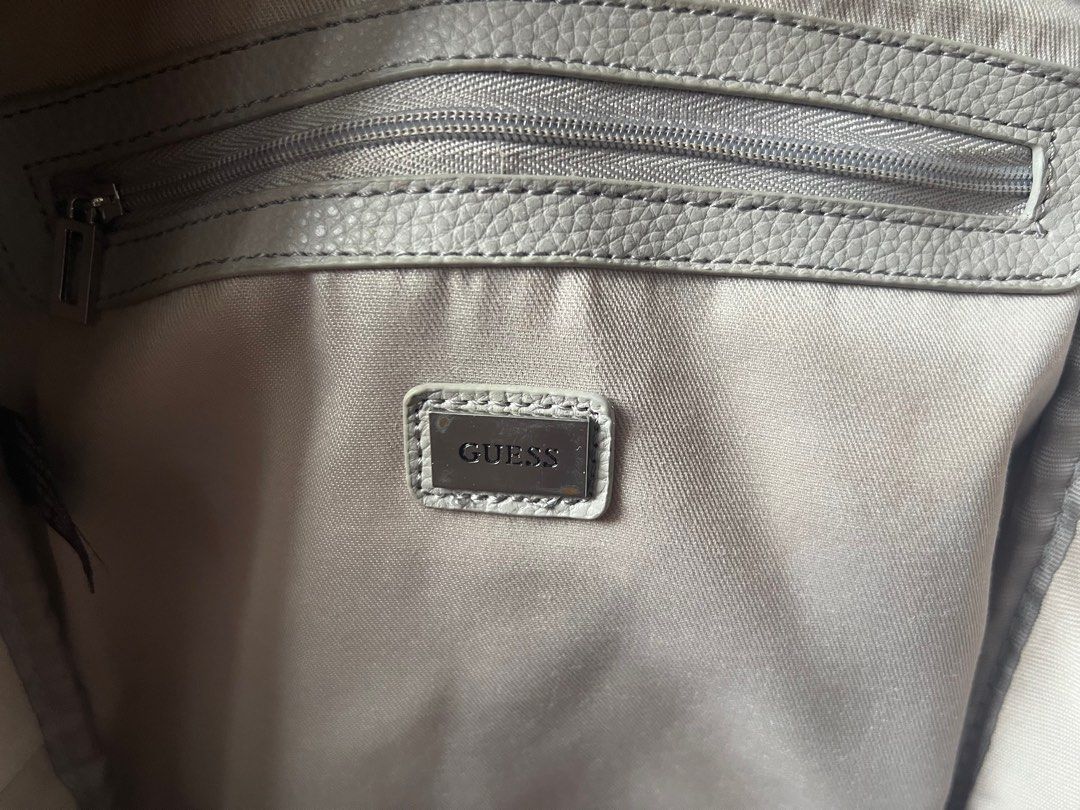 Guess mini leather backpack- Grey (Category: Backpacks) located in Manila. Submitted by shopstop_declutter (Listing ID 1344309469, Image 3). Description: ❀minor defects-zipper slightly threading (see last picture) ❀rfs: declutterring ❀edit: rush sale! can give for 800 ❀mop: bank transfer or gcash.