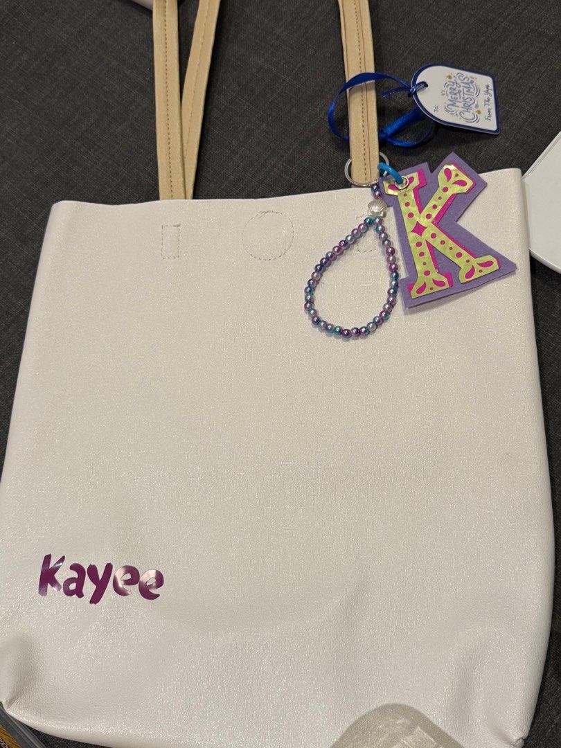 Personalized bag with Key Chain Beads Giveaways (Category: Shoulder Bags) located in Muntinlupa City. Submitted by the_spruce (Listing ID 1344310749, Image 1). Description: Personalized Bag comes with Key Chain and Beaded Trinkets - 480php If Bag only with Name - 350php Comes with Gift Tags and Ribbons Available in White, Green and Beige Will give discounts if bulk order Requires 50% downpayment upon order .