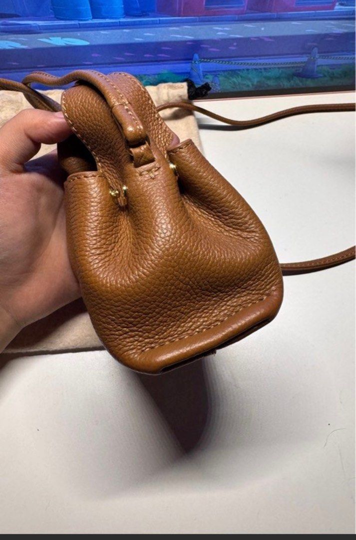 Polene Numero Neuf Micro (Category: Luxury Bags & Wallets) located in Paranaque City. Submitted by eleycruz (Listing ID 1344276963, Image 3). Description: Polene Numero Neuf Micro Good as new !! perfect for errands day! can fit car key, cards, lipstick and alcohol - this bag is already pulled out from Polène - NO signs of usage pin; Parañaque shipping; care of buyer lalamove/grab mop: gcash/ub/bpi inclusion: dust bag rfs: want to buy a cyme mini 