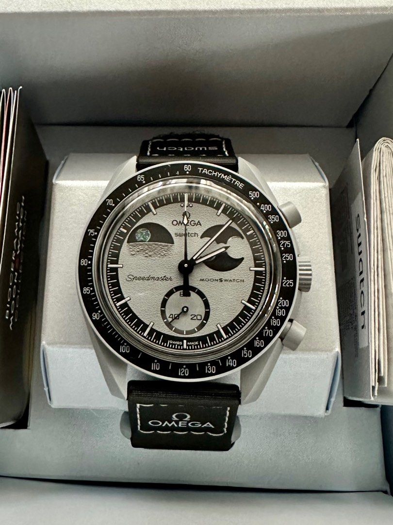 Swatch x Omega Mission to Earthphase (Category: Men's Watches) located in Taguig. Submitted by stan.ph (Listing ID 1344420048, Image 1). Description: A new addition to its popular Bioceramic MoonSwatch collection - the MISSION TO EARTHPHASE. This timepiece boasts not only a moon phase complication but also a world-first earth phase indicator, making its debut on the global market in November 2024..