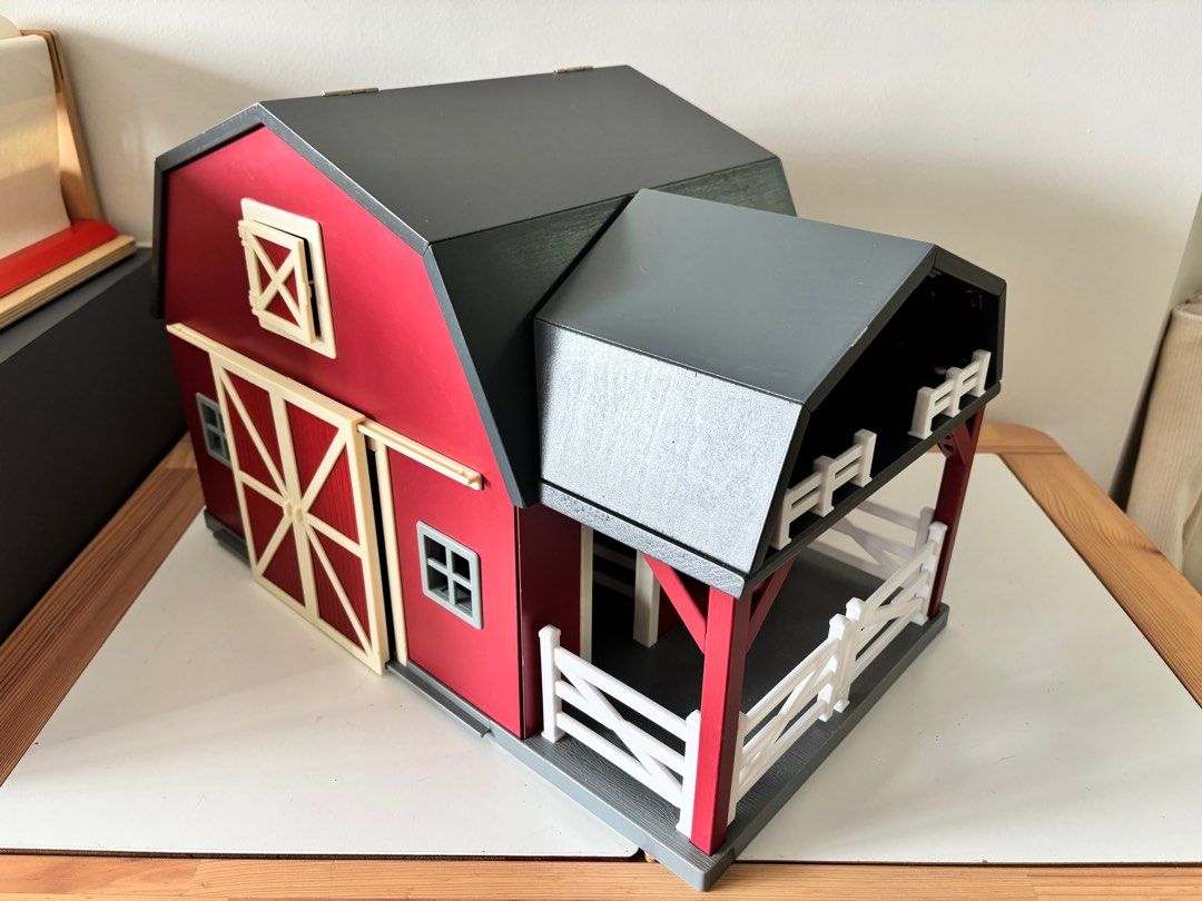 Terra by Battat Wooden Barn (Category: Toys & Games) located in Singapore. Submitted by abel.tan.777 (Listing ID 1344295964, Image 1). Description: Wooden barn for farm play. Some areas are slightly yellow due to use. Barn windows are a loose during opening and closing. Kindly no refund after sale. Thank you..