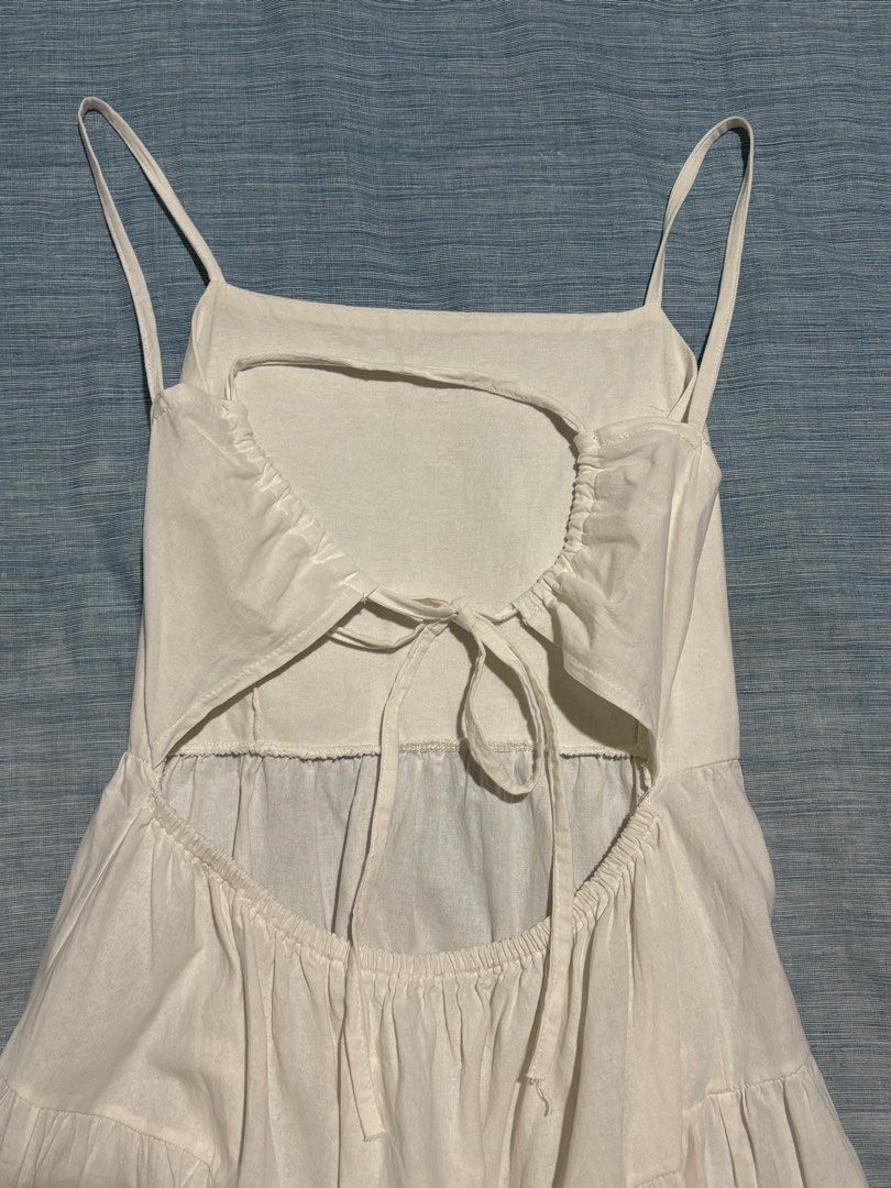 White Linen Dress (Category: Dresses) located in Pasig City. Submitted by fromfrances (Listing ID 1344392412, Image 3). Description: See 4th picture for sizing (adjustable straps + garterized back in the waist area) MOP: Gcash SF & MOD c/o and to be booked by buyer .
