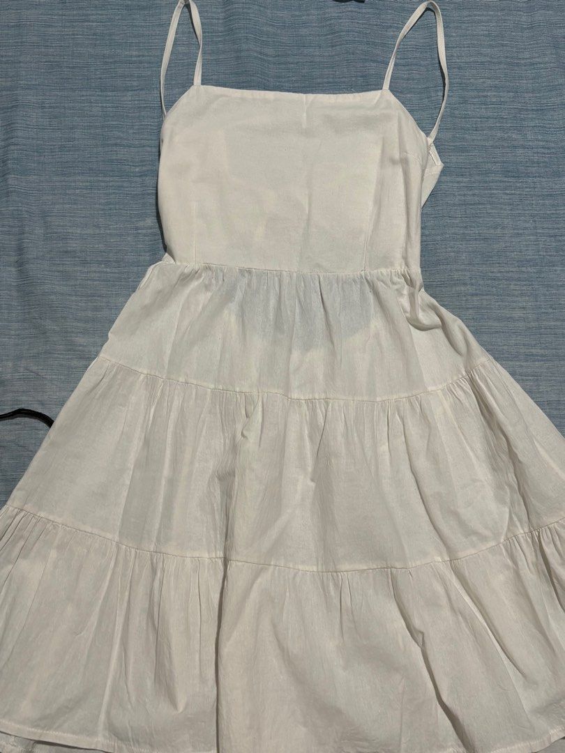 White Linen Dress (Category: Dresses) located in Pasig City. Submitted by fromfrances (Listing ID 1344392412, Image 2). Description: See 4th picture for sizing (adjustable straps + garterized back in the waist area) MOP: Gcash SF & MOD c/o and to be booked by buyer .