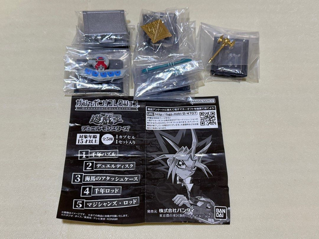 Yu-Gi-Oh bandai gashapon (Category: Designer & Blind Box Toys) located in Singapore. Submitted by benjaminhoharu (Listing ID 1320897423, Image 2). Description: Original price = $8 per gacha try Selling at $40 for full set of 5 designs. GASHAPON COLLETION by Bandai in 2024 gachapon. - Millennium Puzzle - Millennium Rod - Kaiba Corporation Suitcase - Battle City Duel Disk - Dark Magician Magician’s rod Yugioh Gachapon from Bandai, $8 per try, sold 