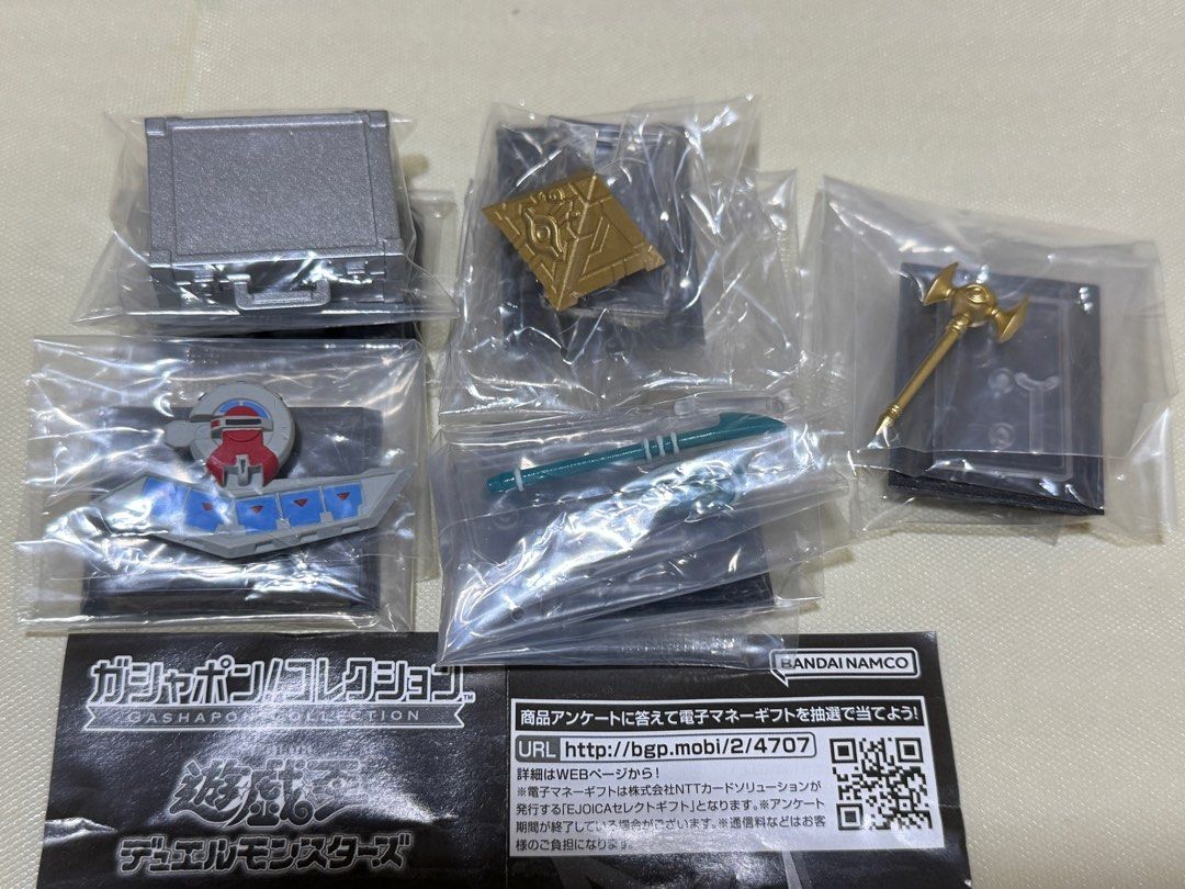 Yu-Gi-Oh bandai gashapon (Category: Designer & Blind Box Toys) located in Singapore. Submitted by benjaminhoharu (Listing ID 1320897423, Image 3). Description: Original price = $8 per gacha try Selling at $40 for full set of 5 designs. GASHAPON COLLETION by Bandai in 2024 gachapon. - Millennium Puzzle - Millennium Rod - Kaiba Corporation Suitcase - Battle City Duel Disk - Dark Magician Magician’s rod Yugioh Gachapon from Bandai, $8 per try, sold 