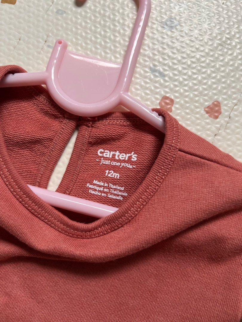 Carter’s Long sleeved top (Category: Babies & Kids Fashion) located in Tarlac. Submitted by eloijv (Listing ID 1339636303, Image 2). Description: Once used only Rust colored top 12 mos on tag.