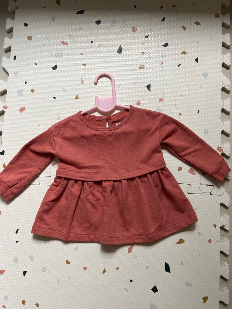 Carter’s Long sleeved top (Category: Babies & Kids Fashion) located in Tarlac. Submitted by eloijv (Listing ID 1339636303, Image 1). Description: Once used only Rust colored top 12 mos on tag.