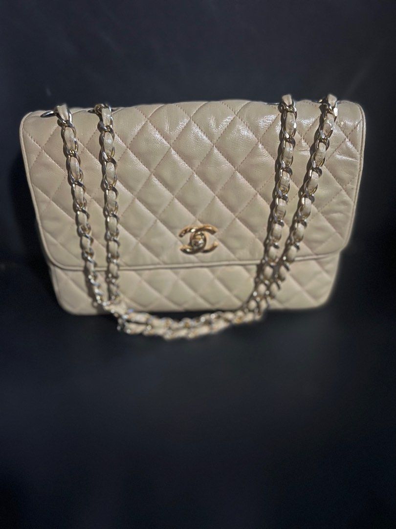 Chanel Flap (Category: Luxury Bags & Wallets) located in Valenzuela. Submitted by happyhabit (Listing ID 1339677400, Image 1). Description: Authentic Vintage Chanel Details: • Measurements: L: 10”, W: 3”, H: 7” • Color: Beige • Includes dust bag • Condition: Good, with normal signs of usage (minor scratches) • Previously recolored to match the original beige Terms: No return No exchange. • Shipping c/o buyer • Reason for selling: Not using anymor