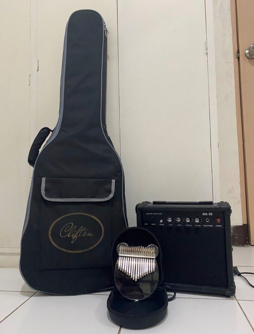 Clifton Stratocaster Electric Guitar with Amplifier, Glass Kalimba & Accessories (Category: Musical Instruments) located in Pilar. Submitted by zx.06 (Listing ID 1339697766, Image 1). Description: FOR SALE ❗ Clifton Stratocaster Electric Guitar with Glass Kalimba 🎸(BUNDLE) AROUND BATAAN ONLY ❗ Kindly send me a PM 📲 (only for those who are interested) #electricguitar #guitar #sale #strato #stratocaster #bataan #kalimba #glass.