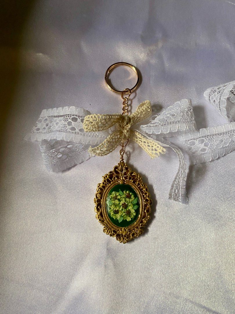 Coquette keychains (Sold per piece) (Category: Charms) located in Meycauayan. Submitted by tinpatchouli (Listing ID 1339608273, Image 3). Description: Available: Sunflowers painting pendant 1 Sunflower painting pendant.