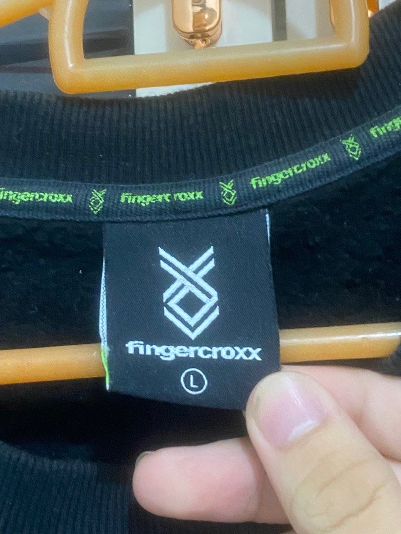 Fingercroxx Black Sweater (Category: Coats, Jackets and Outerwear) located in Quezon City. Submitted by mattdwayne (Listing ID 1339724534, Image 3). Description: Size: Large on Tag Width: 19.5 Length: 27 Pasok pa sa Large to Semi XL bro di naman ganon ka fitted saken. best fit siguro Medium kung trip mo yung medjo loose. One of my Favorite sweater i have but sadly i had to let it go because nakakaliitan ko na :( Makapal tela di ka mag sisisi kahi