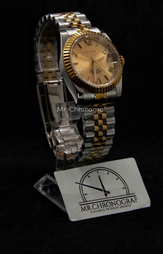 Seiko Mod Datejust Two-tone (Category: Luxury Watches) located in Manila. Submitted by rafael_lesaguis (Listing ID 1339666427, Image 2). Description: BRANDNEW (Never-yet-worn) Seiko Mod Datejust Two-tone Movement: Seiko NH35 Automatic Date Feature with hacking seconds and winding Two-tone Strap Dial: Datejust roman gold markers with date window Glass: Sapphire scratch resistant Hands: Datejust Timegrapher calibrated Seals and gaskets lubricated I