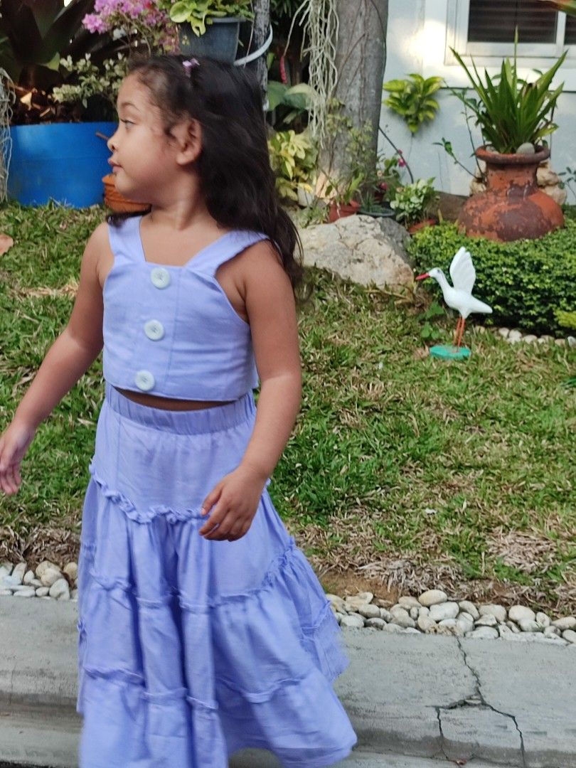 SUPER CUTE! Light Purple Terno Top + Skirt (Category: Babies & Kids Fashion) located in Taguig. Submitted by daylightsavingtime (Listing ID 1339555884, Image 3). Description: Used twice (2x) only. Model is 4yrs and 2mos old. Fitting depends on built po ng bata😊 Happy Shopping❣️.