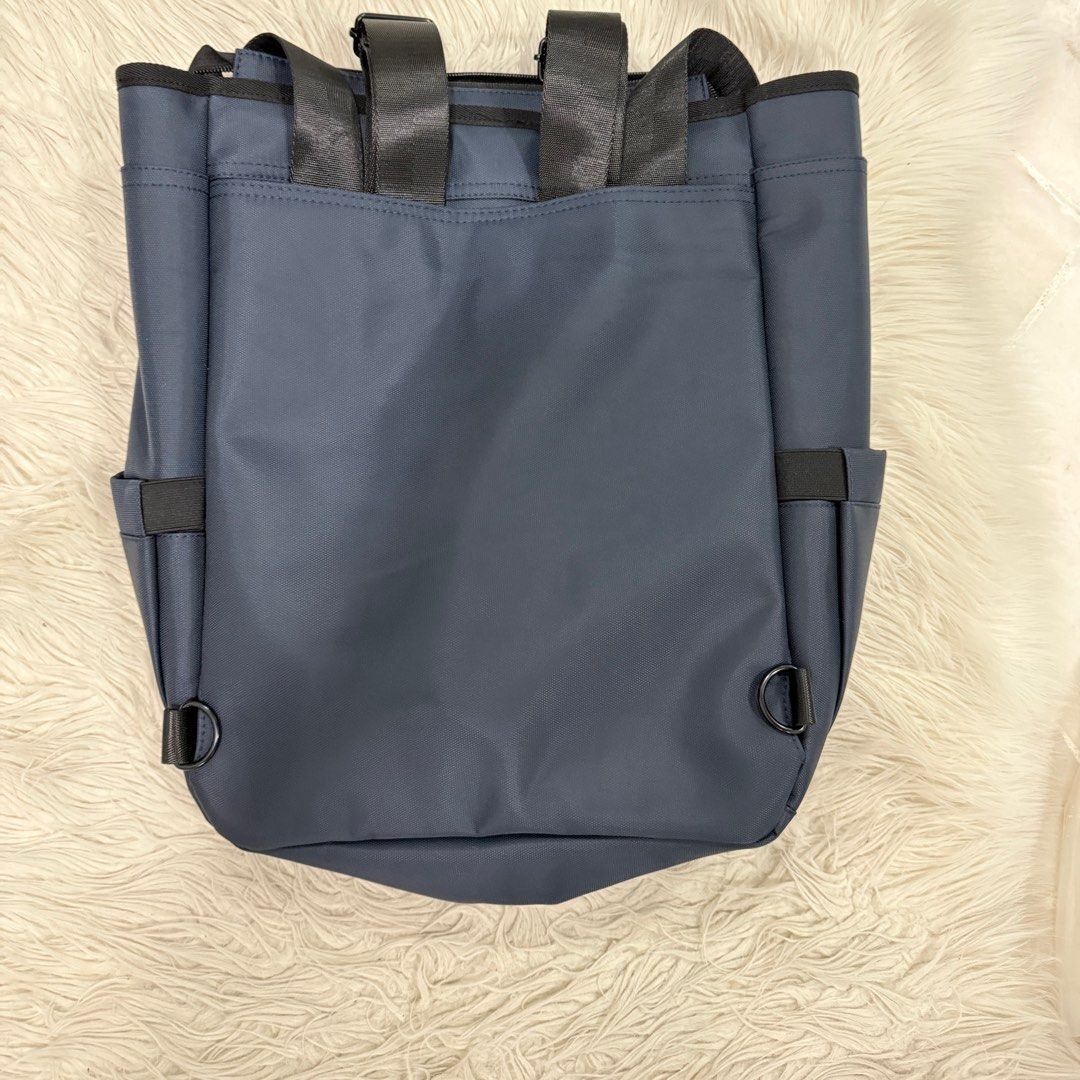 Backpack (Category: Backpacks) located in Singapore. Submitted by k00lsheep (Listing ID 1344457188, Image 3). Description: Backpack Brand NEW Not used at all Versatile backpack with dual carrying options: • The backpack sling can be neatly tucked into the back compartment. (Picture 3) • Features multiple compartments, including a dedicated laptop section. (Picture 5) • Both sides come with dual slots for added storage. Dimensions: • Length: 39cm 