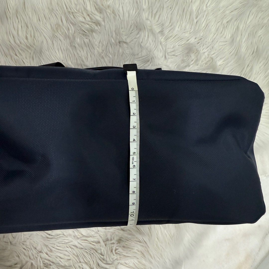 Backpack (Category: Backpacks) located in Singapore. Submitted by k00lsheep (Listing ID 1344457188, Image 9). Description: Backpack Brand NEW Not used at all Versatile backpack with dual carrying options: • The backpack sling can be neatly tucked into the back compartment. (Picture 3) • Features multiple compartments, including a dedicated laptop section. (Picture 5) • Both sides come with dual slots for added storage. Dimensions: • Length: 39cm 